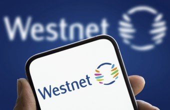 Westnet logo is displayed on smartphone. Westnet is a Perth-based Australian telecommunications