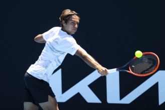MELBOURNE, AUSTRALIA, JANUARY 11: Flavio Cobolli of Italy on his way to beating Benjamin Hassan of