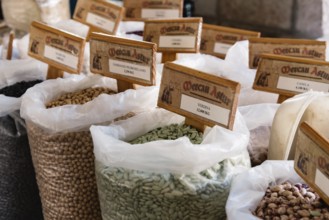 Cangas de Onis, Spain, March 31, 2019: Assortment of beans and other legumes in sacks in food
