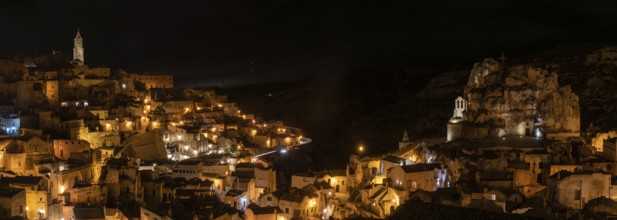 Famous cave church Saint Mary of Idris and the cathedral of Matera at night, Italy, Europe