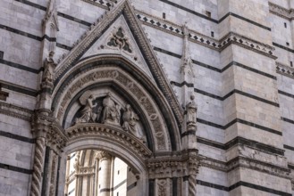 Portal decoration of the aisle enlarged transept of the Siena cathedral, Italy, Europe