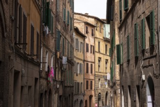 Somewhere in the streets of the old medieval Siena, Italy, Europe