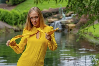 A Beautiful Blonde Model Poses Outdoors In Her Fall Clothes, Charlotte, United States of America