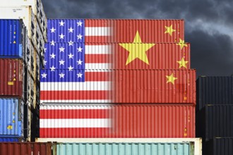 Stacked containers with flags of USA and China, photomontage
