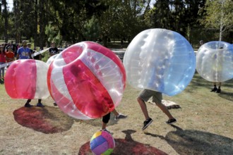 Sofia, Bulgaria - September 24, 2016: Boys are playing bubble football game in the park
