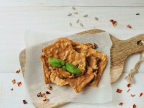 Gluten-freen crispbreads made of buskwheat flour. Green buckwheat flour smoked paprika sunflower