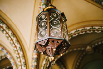 Antique German lamp on the ceiling. Octagon with Fresnel lenses.