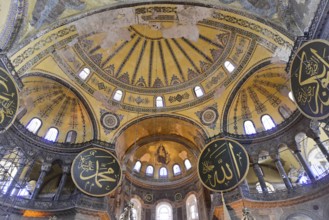 Medallions with Arabic script on a wall in the Hagia Sophia mosque in Istanbul, Turkey, Asia,