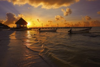 Holbox Island pier palapa sunset beach in Mexico Quintana roo