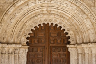 Portal with archivolts and chamfered chambrane, Parish Church of San Bartolomé, Campisábalos,
