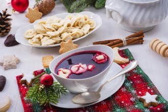 Barszcz (beetroot soup) with small pierogi
