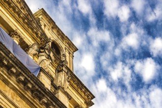 Detail of an italian baroque church on blue sky