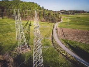 Electrical power substation in the country side of Slovenia. Fields and forests surrounding the