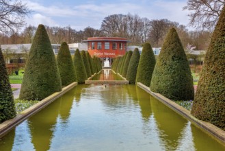 Lisse, Netherlands, April 4, 2016: Spring landscape, touristic park with water fountain and Oranje