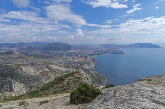 View of the seaside town from the slope of the mountain. Crimea