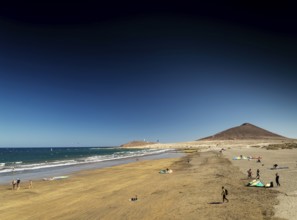 El medano tourist beach and montana roja famous landscape in tenerife spain