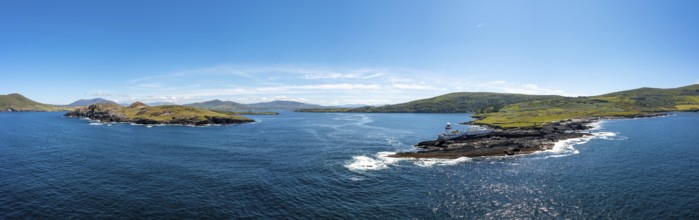 An aerial panorama of the coastal landscape of the Iveragh Peninsula with Beginish and Valentia