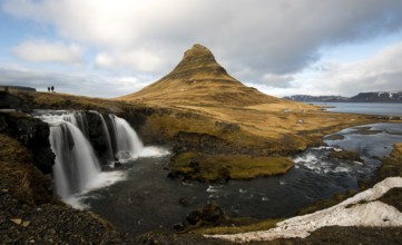 Kirkjufellsfoss waterfalls with the Kirkjufell mountain, at Grundarfjordur, on the Snaefellsnes