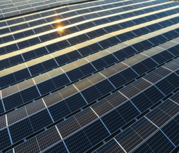 Industrial warehouse with roof loaded with solar panels