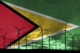 Guyana flag wind farm at sunset, sustainable development, renewable energy Wind Turbines