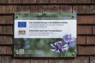 Wooden shingle wall with information sign, agricultural fund, near Niedersonthofen, Allgäu, Swabia,