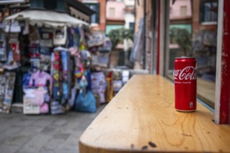 Coca Cola can on a wooden table, Venice, Italy, Europe