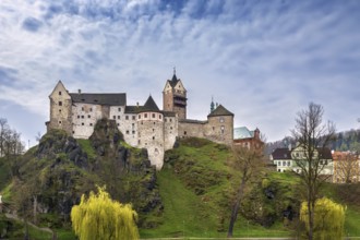 Loket Castle is a 12th-century castle about 12 kilometres from Karlovy Vary on a massive rock in