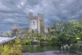 Cahir Castle is one of the largest castles in Ireland, is sited on an island in the river Suir