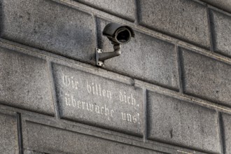 Surveillance camera on a building, symbol for surveillance, internal security, control, data
