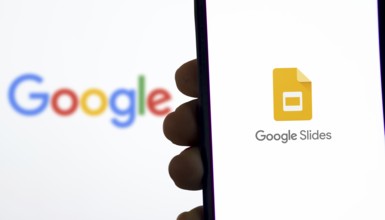 Google Slides Logo on Phone Screen