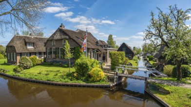 Giethoorn Netherlands, panorama city skyline at canal and traditional house in Giethoorn village