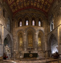 St Davids, United Kingdom, 28 August, 2022: panorama view of the ornate altar inside the St Davids