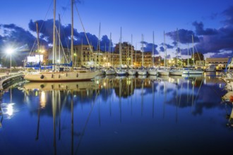 Idyllic view on Sailboats in harbor of Palermo -blue time in the city. Wonderful cloudscape
