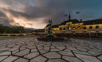 Uppsala, Uppland, Sweden, 07 27 2019 Facade of the Railway station and the square by night, Europe