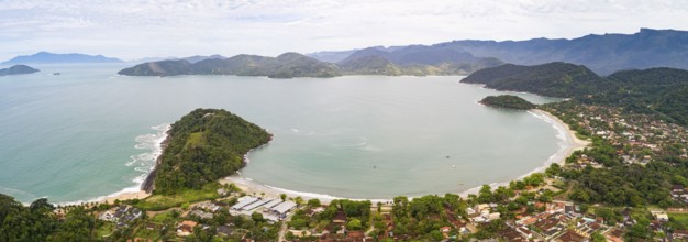 Aerial view panorama of town and Praia do Lazaro (Lazaro beach), Ubatuba, Brazil, South America