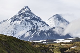 Nature of Kamchatka Peninsula, beautiful volcanic landscape: view on Kamen Volcano, active