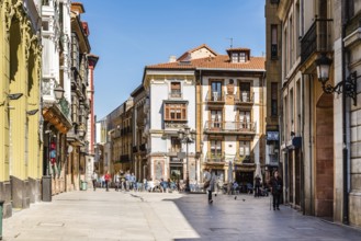 Oviedo, Spain, April 1, 2019: Street with traditional houses in historic city center, Europe