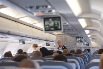 10.06.2016, Helsinki, Finland, Europe, Flight attendants serve passengers on a flight to Helsinki.