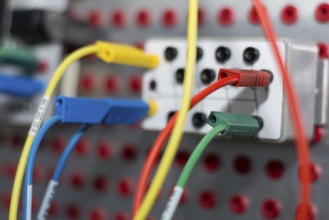 Close-up of a control circuit with coloured cables