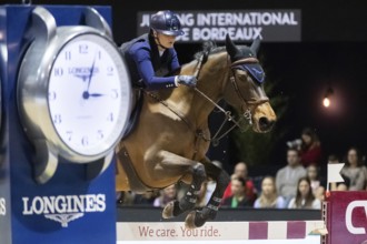 Jessica Burke of Ireland competes in the equestrian Audi Grand Prix at Jumping International