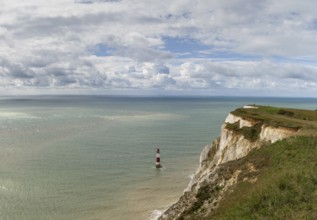 View of the Beachy Head Lighthouse in the English Channel and the white cliffs of the Jurassic