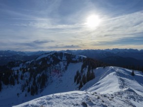 View from Seekarkarkreuz, a mountain in the Bavarian alps, Germany, along its ridge towards the