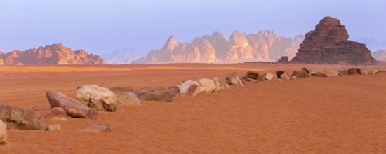 Wadi Rum, Jordan. The orange sand desert banner landscape and mountains at dawn, sunset