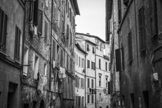 Somewhere in the streets of the old medieval Siena, Italy, Europe