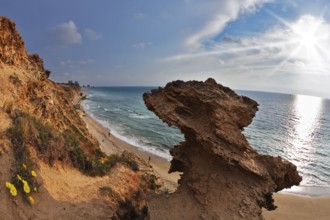 Freakish rocks on coast of Mediterranean sea shined by the sun