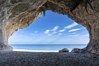 The view out of one of the many seaside caves at the beach of Cala Luna in Sardinia
