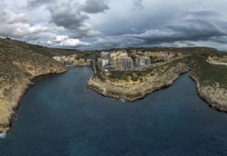 Drone view of Xlendi village and bay on Gozo Island in Malta