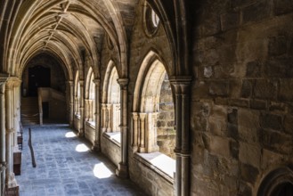 Evora, Portugal, June 30, 2022: The cloister of the Cathedral of Evora a sunny blue sky day of