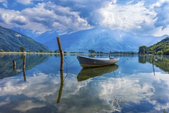 Boat moored on Mera river in Valchiavenna