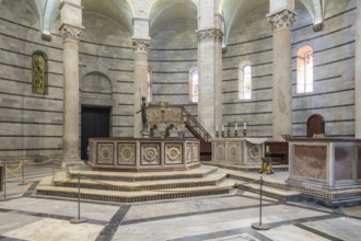 Pisa, Italy, 29 June 2023: Baptistery interior, basilica altar, catholic church. Italy travel